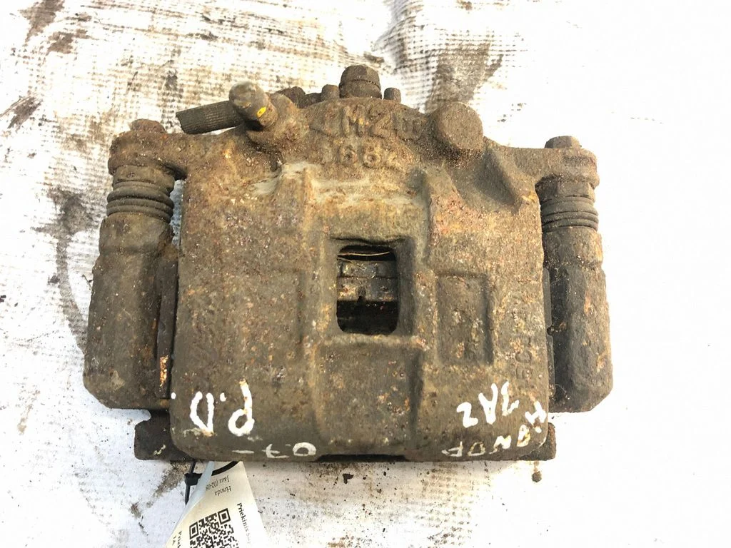 Front brake caliper – front right