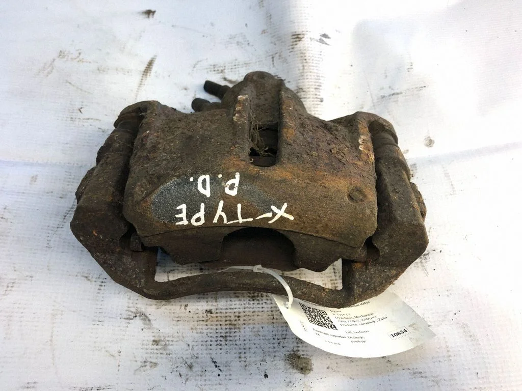 Front brake caliper – front right