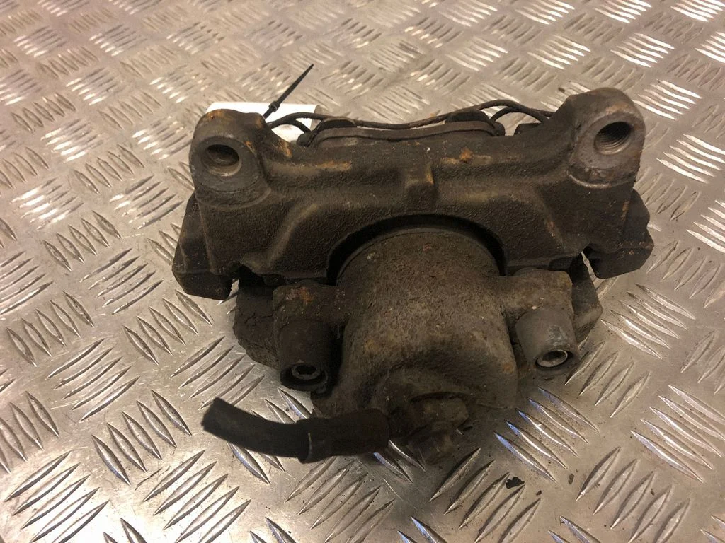Front brake caliper – front right