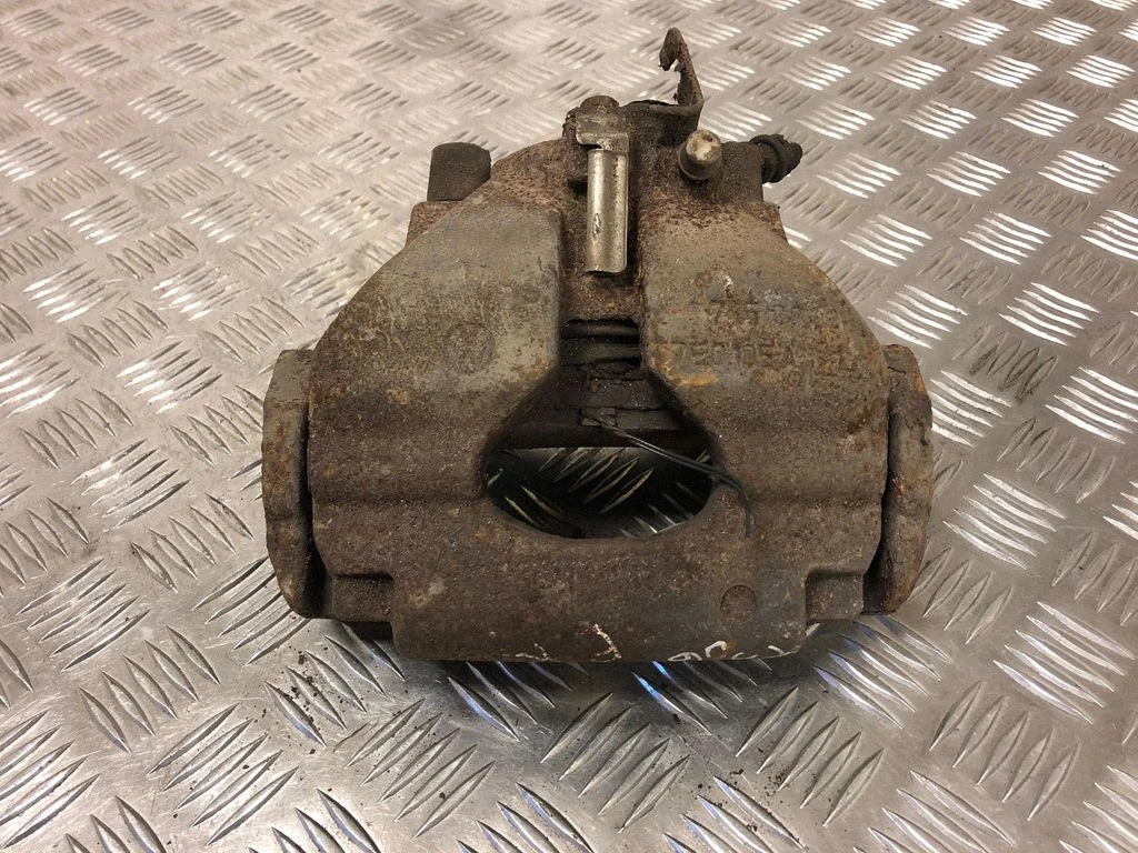 Front brake caliper – front left