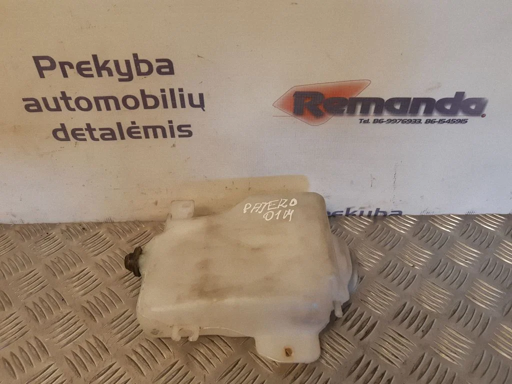 Logu mazgāšanas šķidruma tvertne – Mitsubishi Pajero Sport I (1996-2008)