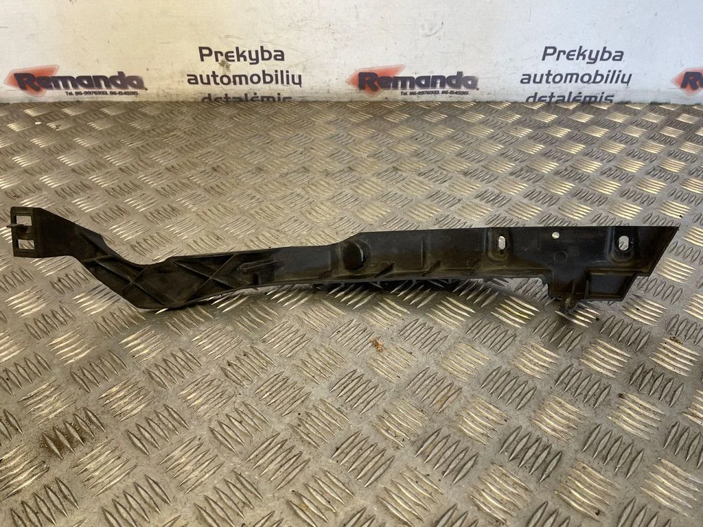 Headlight/headlamp mounting bracket – Opel Astra J (2010-2015)