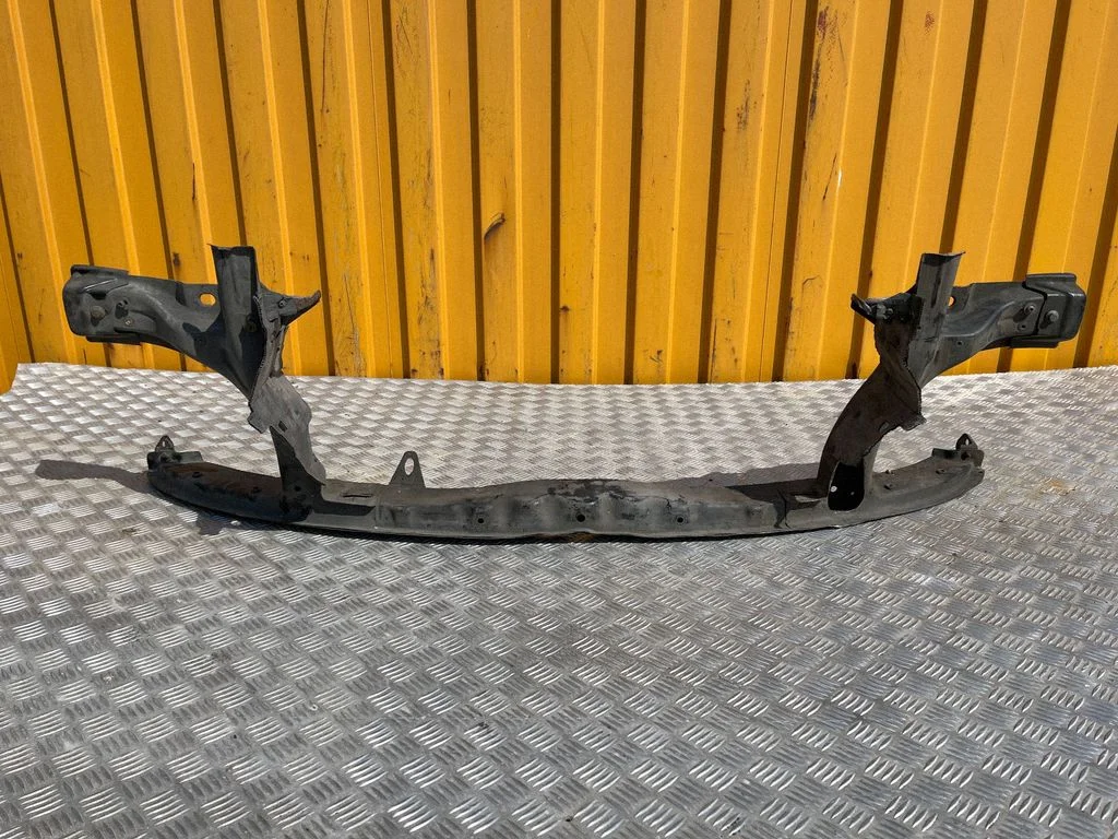 Radiator support slam panel