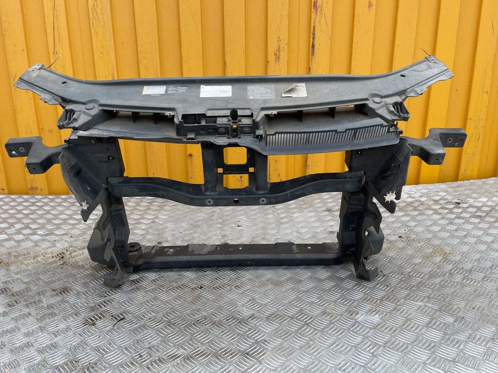 Radiator support slam panel