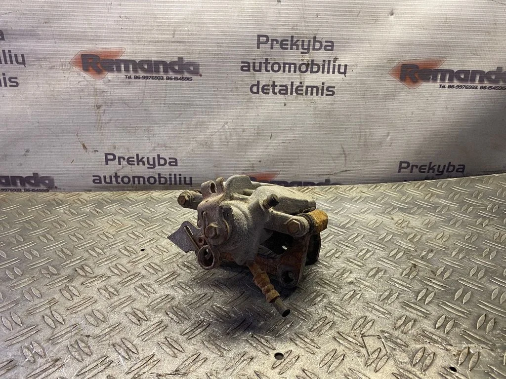 Rear brake caliper – rear left
