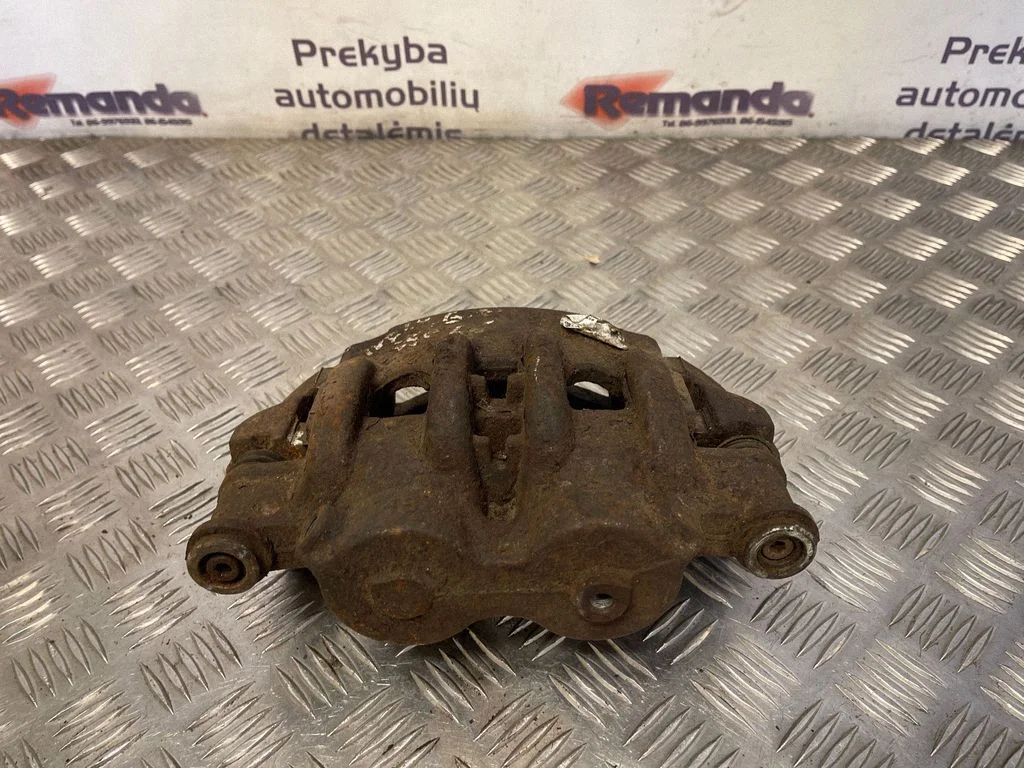 Zacisk hamulcowy tylny – lewy tył