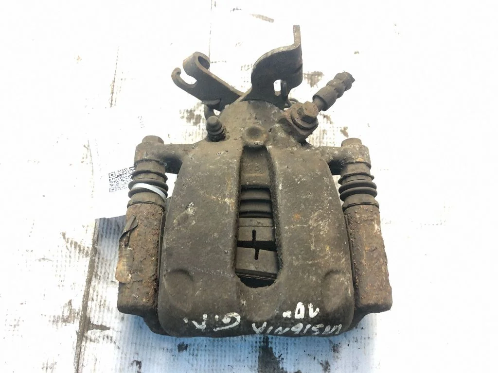 Rear brake caliper – rear left