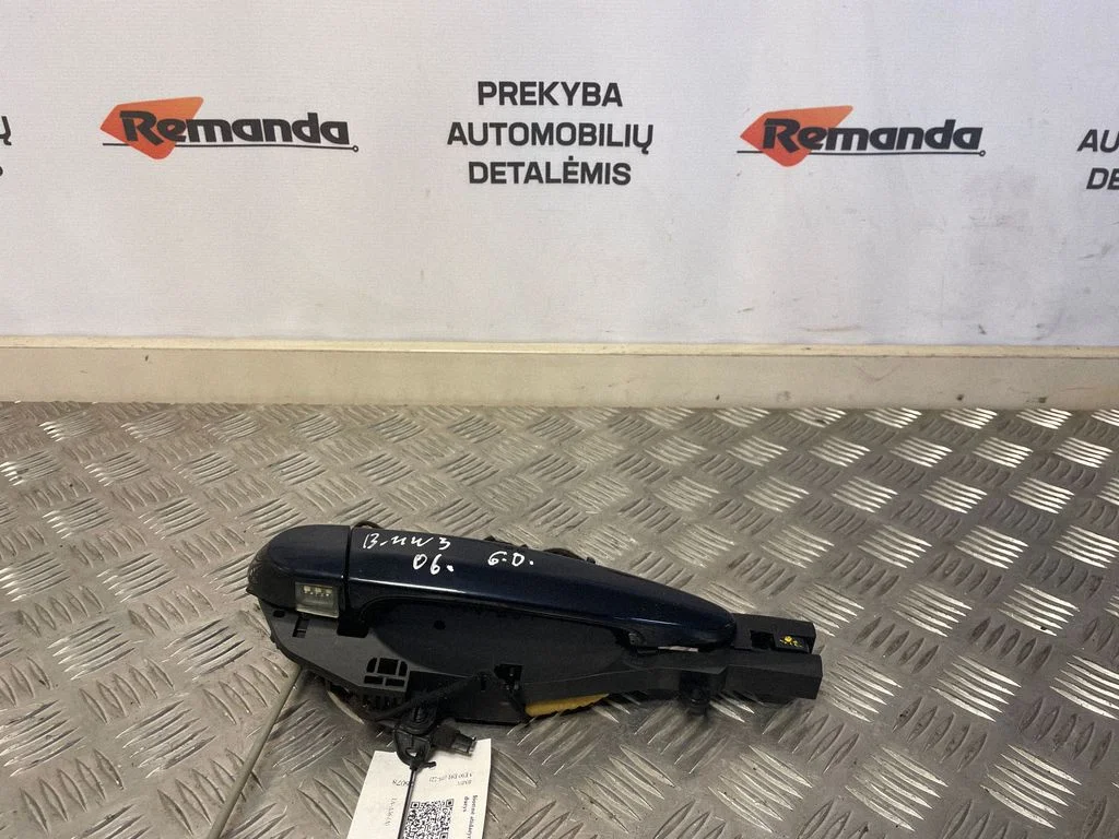 Aizmugurējo durvju ārējais atvēršanas rokturis