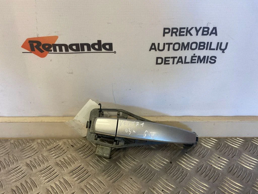 Aizmugurējo durvju ārējais atvēršanas rokturis – aizmugurējā kreisā