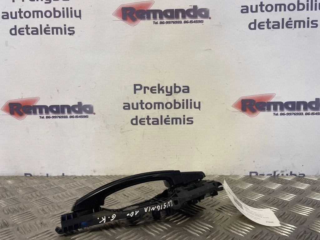 Aizmugurējo durvju ārējais atvēršanas rokturis – aizmugurējā kreisā