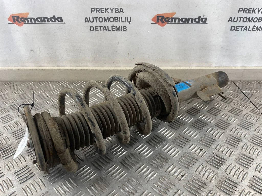 Front shock absorber with coil spring 32Q31