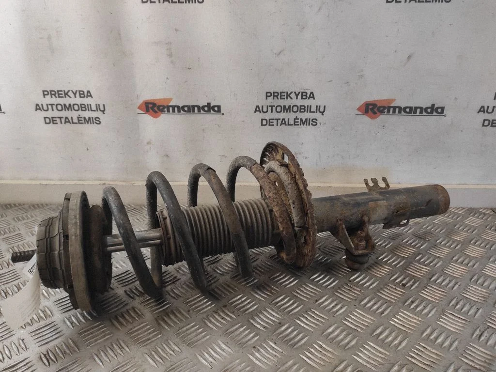 Front shock absorber with coil spring – front right