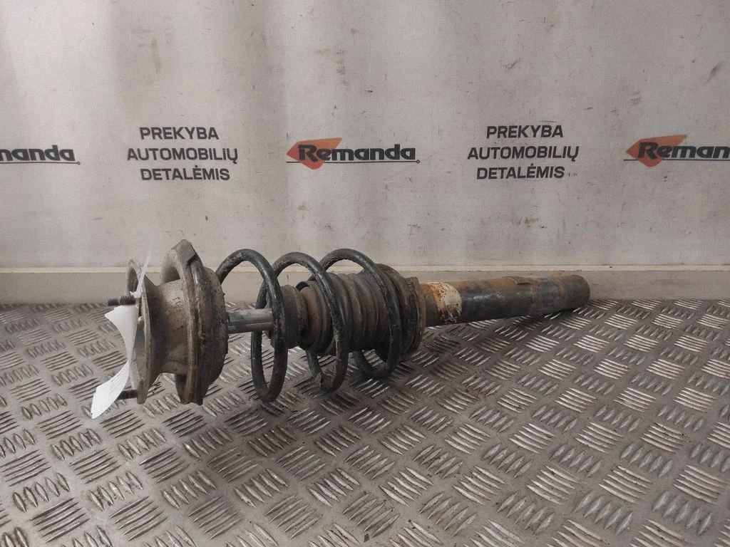 Front shock absorber with coil spring – front right
