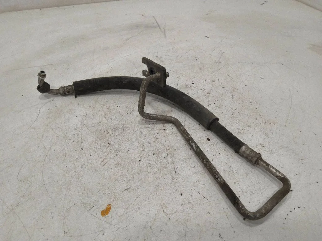 Air conditioning (A/C) pipe/hose – front