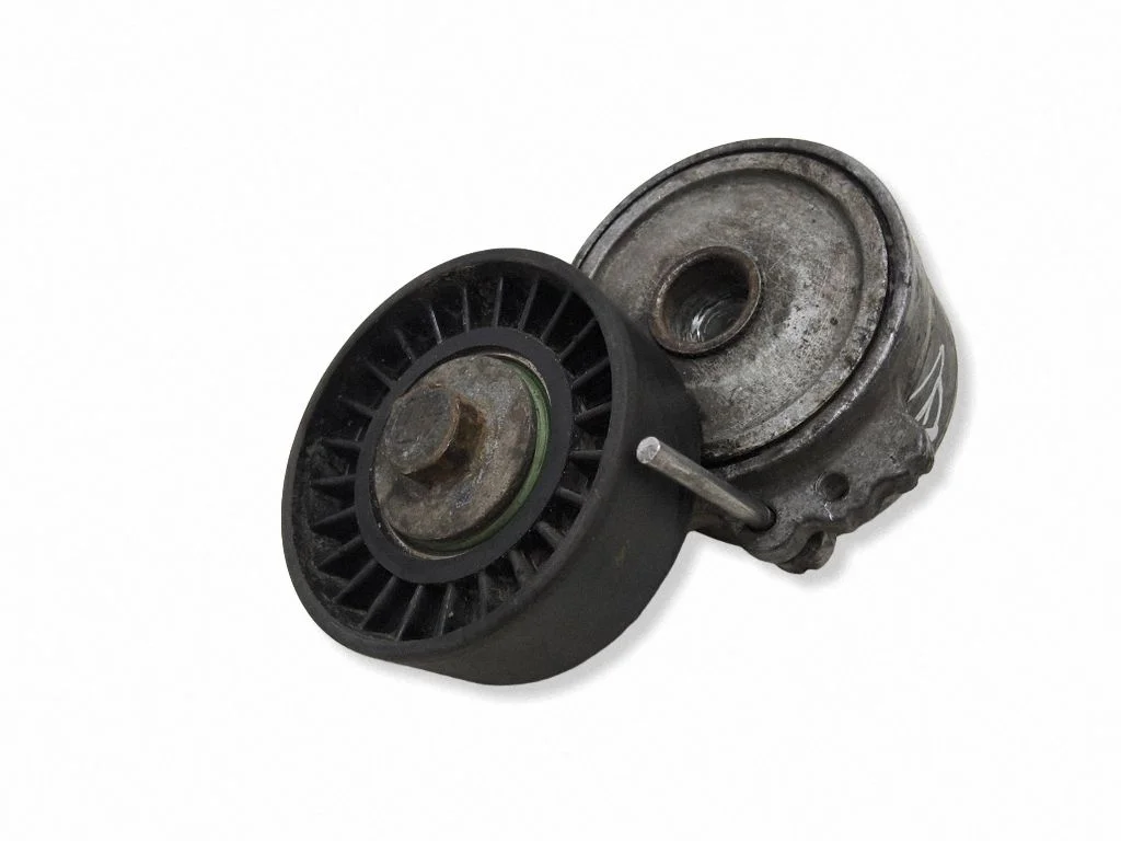 Generator/alternator belt tensioner – front
