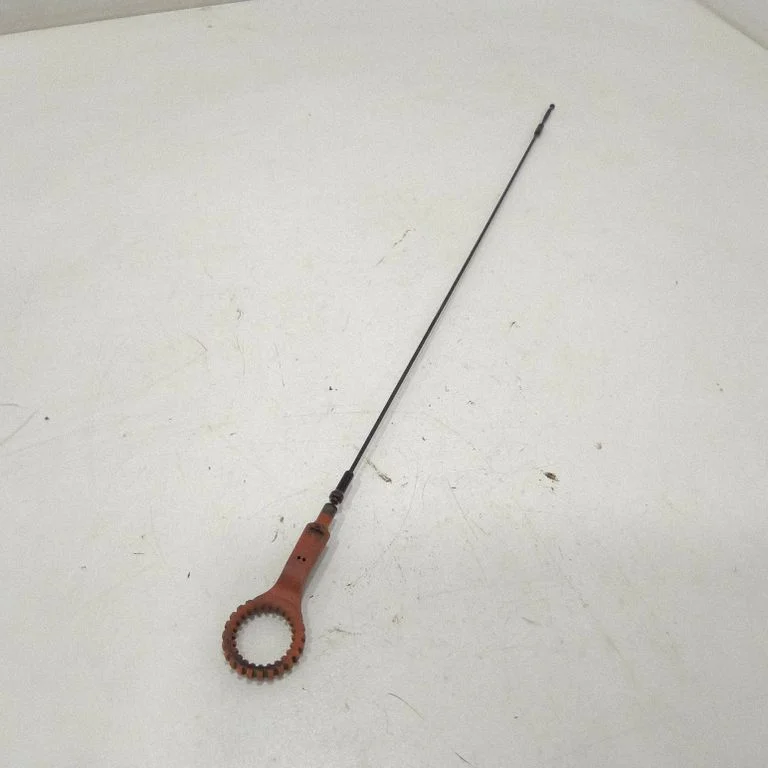 Oil level dip stick – front