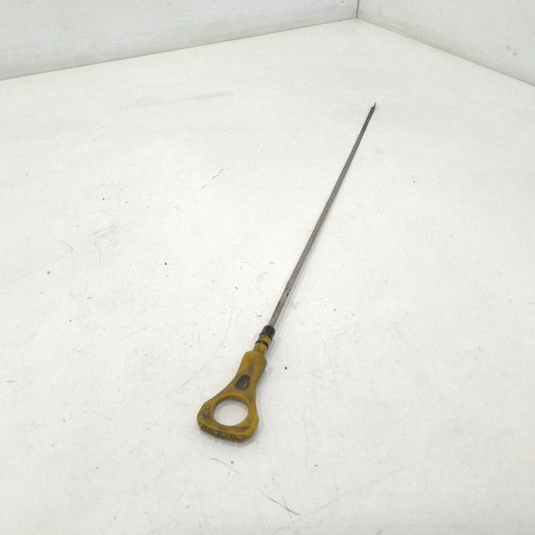 Oil level dip stick – front