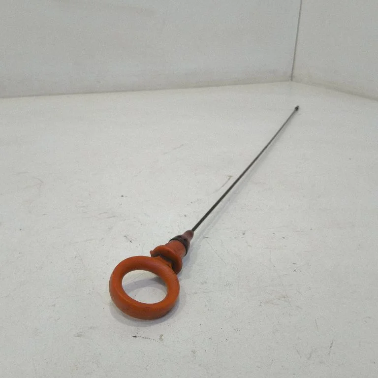 Oil level dip stick – front