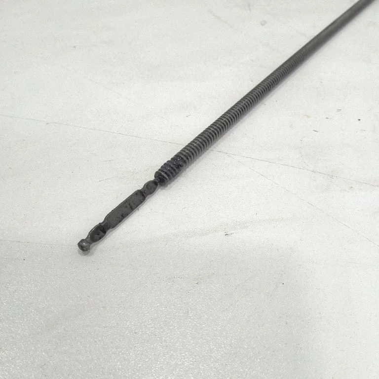 Oil level dip stick – front
