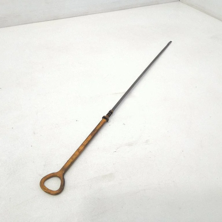 Oil level dip stick – front