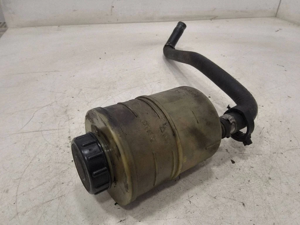 Power steering fluid tank/reservoir – front
