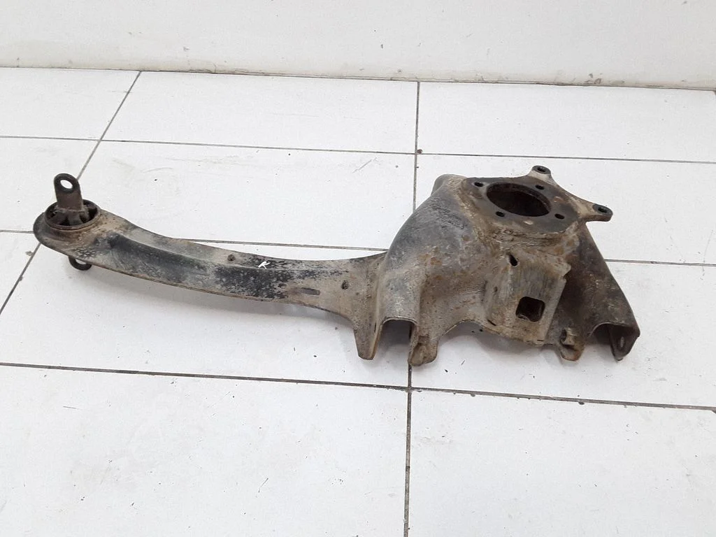 Rear upper control arm/wishbone – left