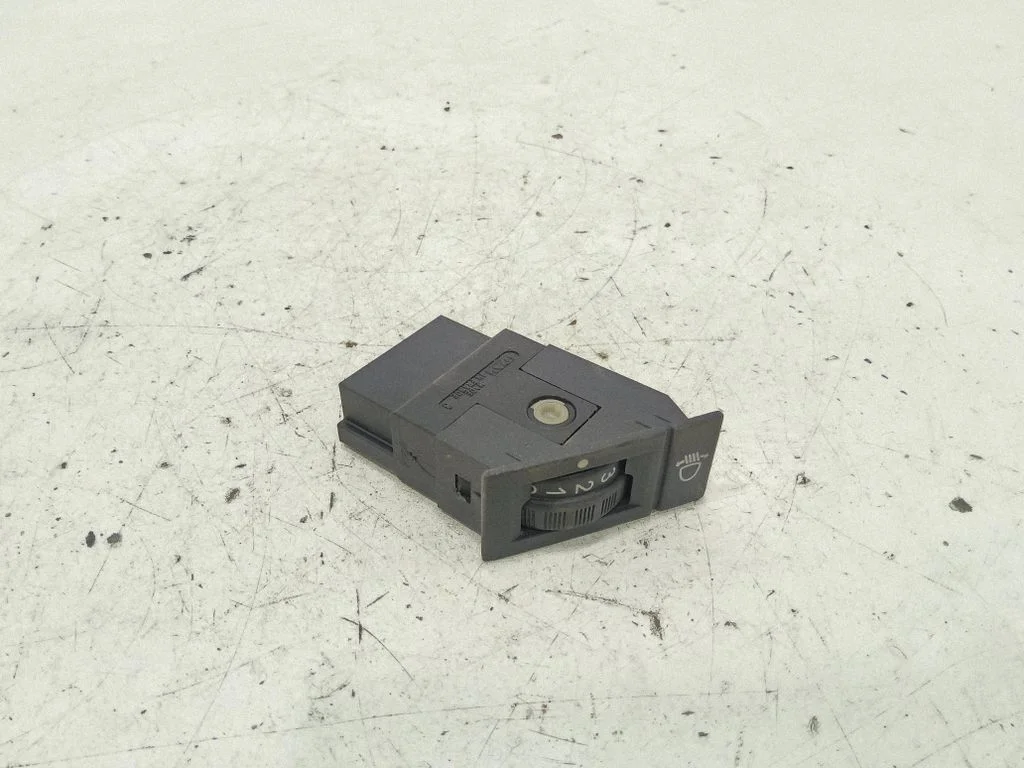 Headlight level height control switch – front