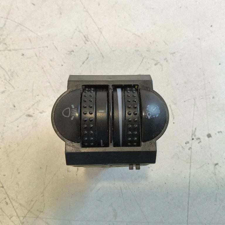 Headlight level height control switch
