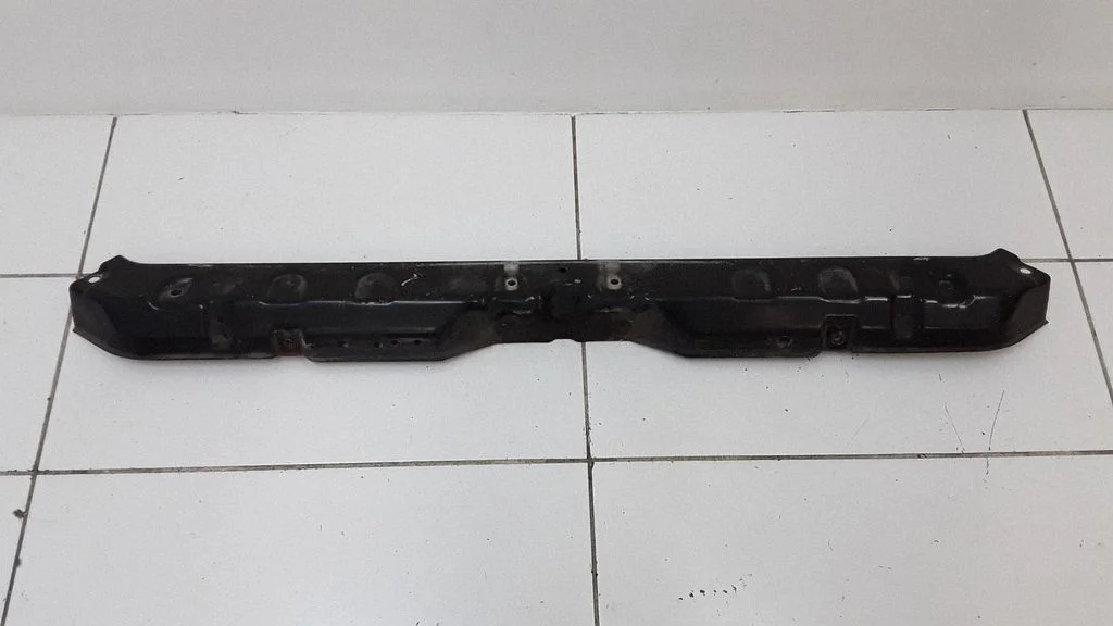 Top upper radiator support slam panel