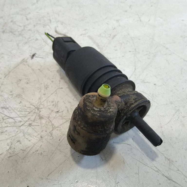 Windscreen/windshield washer pump – front