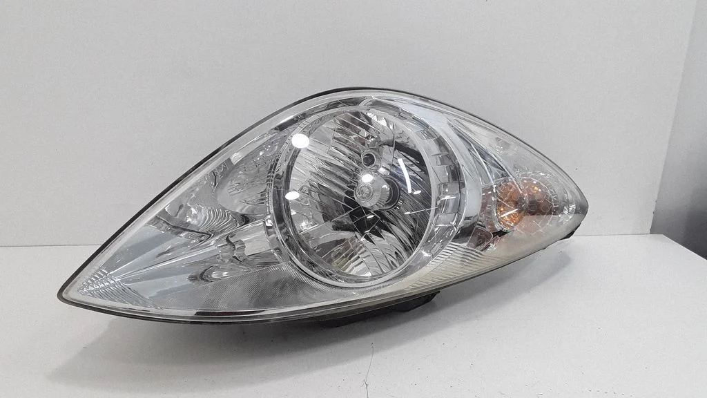 Headlight/headlamp – left