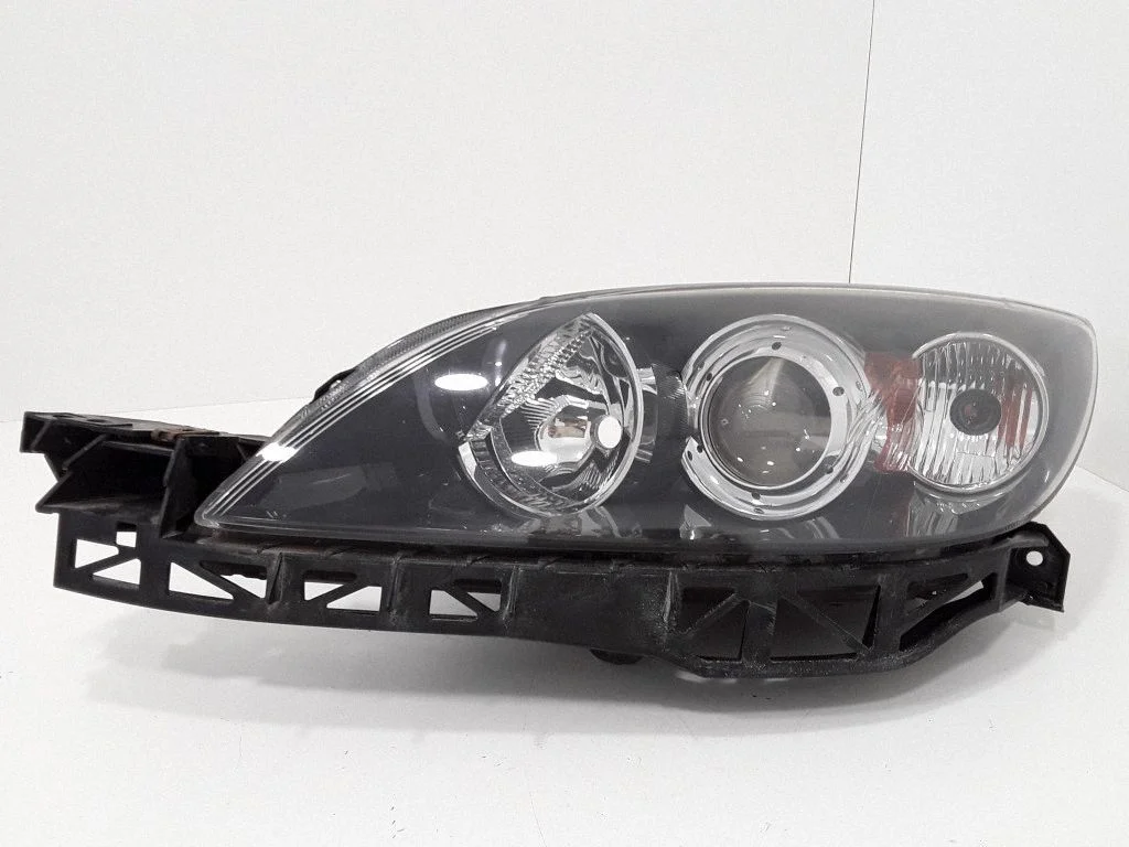 Headlight/headlamp – left