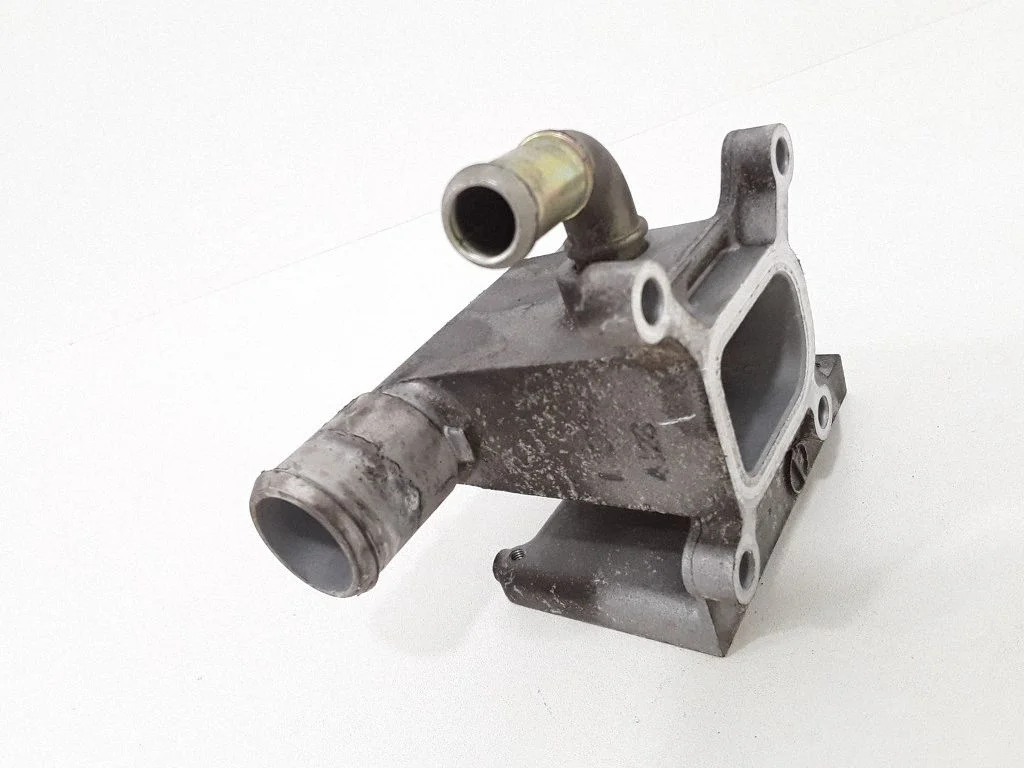 Thermostat/thermostat housing