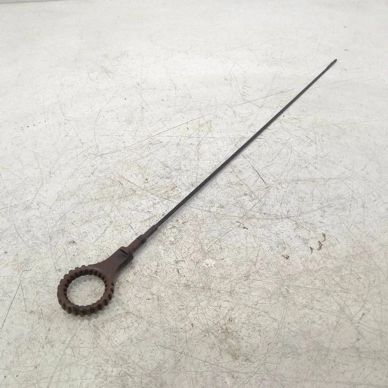 Oil level dip stick – front