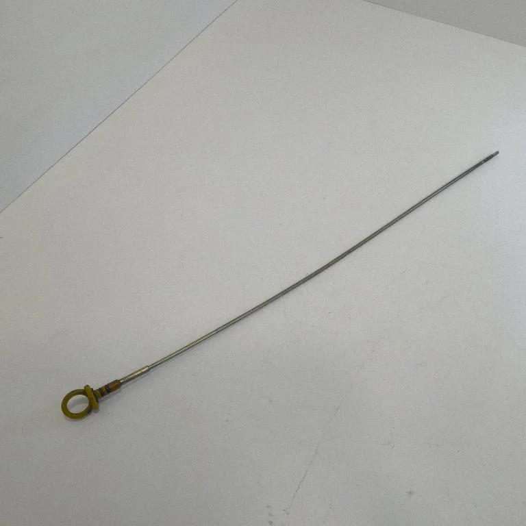 Oil level dip stick – front