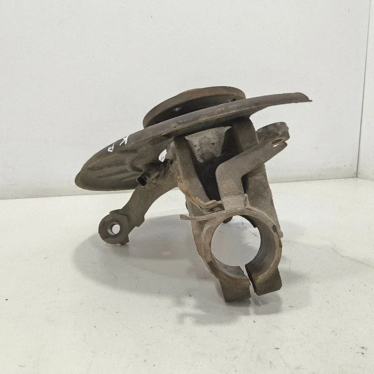 Front wheel hub spindle knuckle – front left