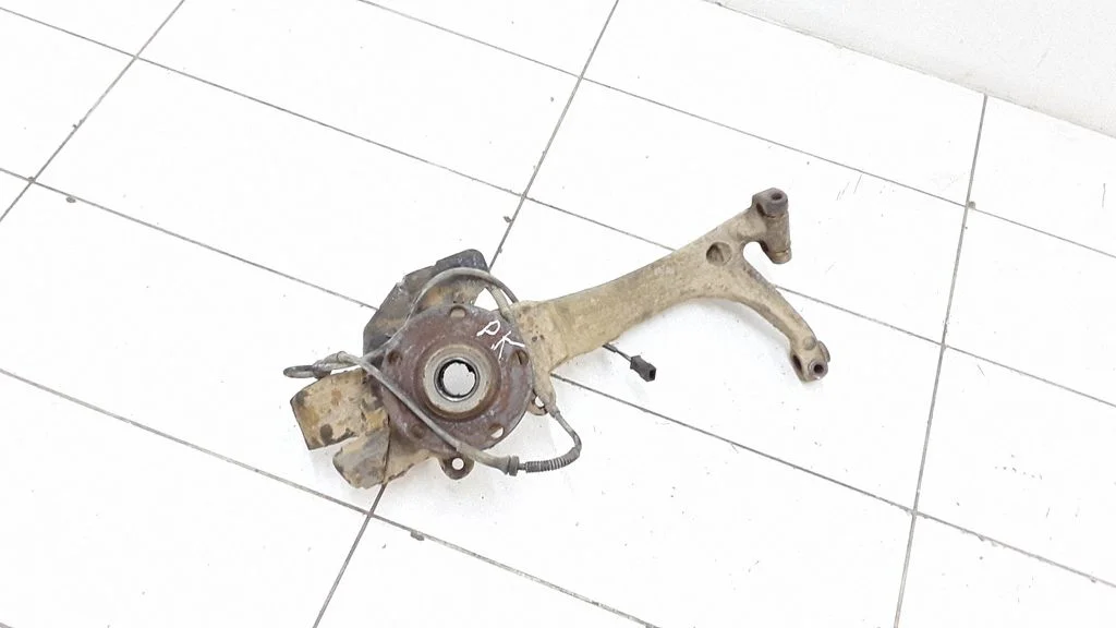 Front wheel hub spindle knuckle – front left