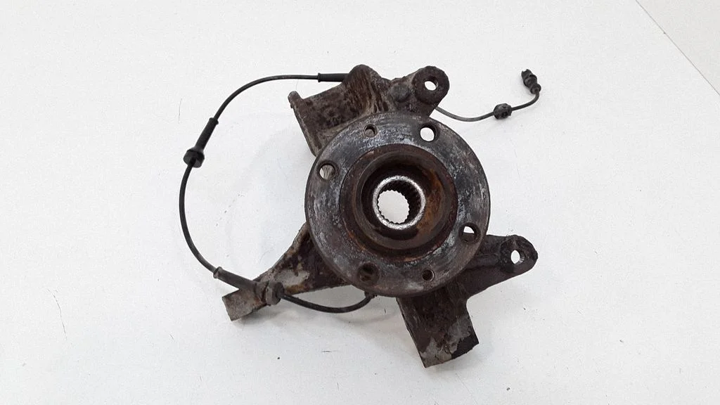 Front wheel hub spindle knuckle – right