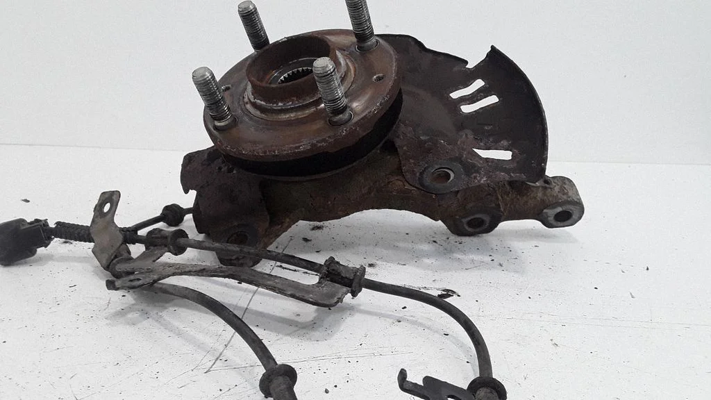 Front wheel hub spindle knuckle – right