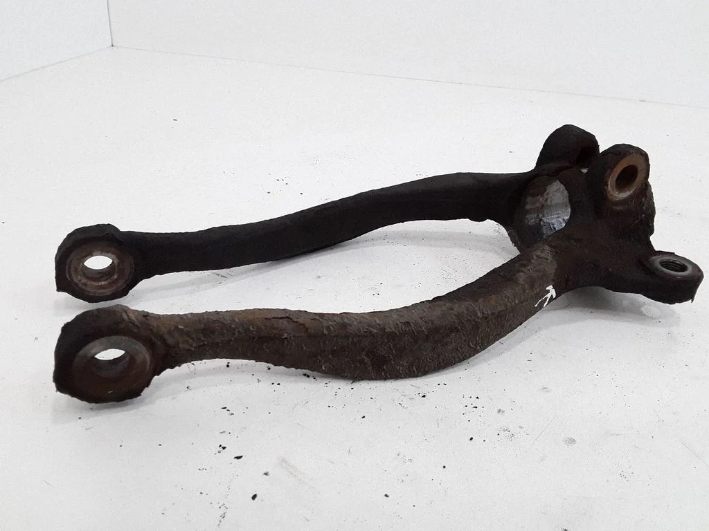 Front lower control arm/wishbone – left