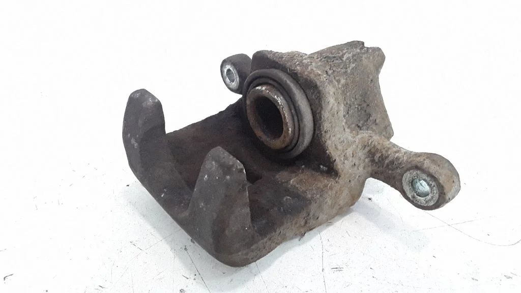 Rear brake caliper – left