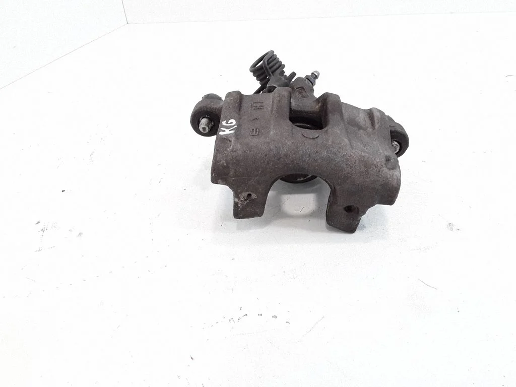 Rear brake caliper – left