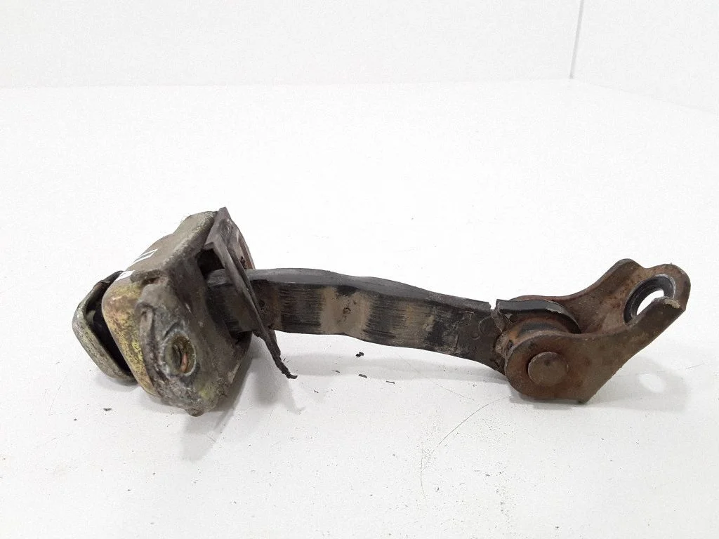 Front door check strap stopper – left