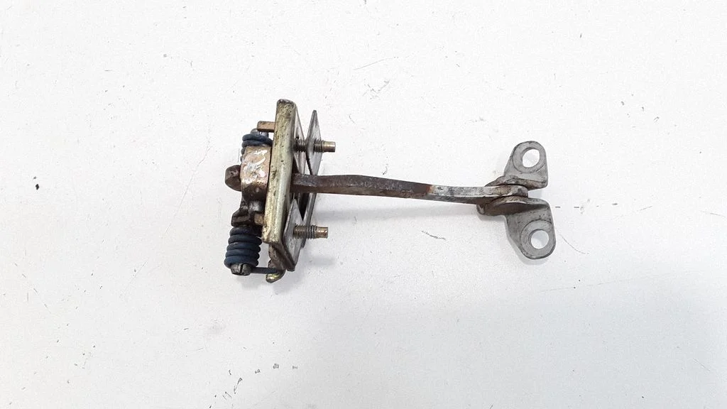 Rear door check strap stopper – right
