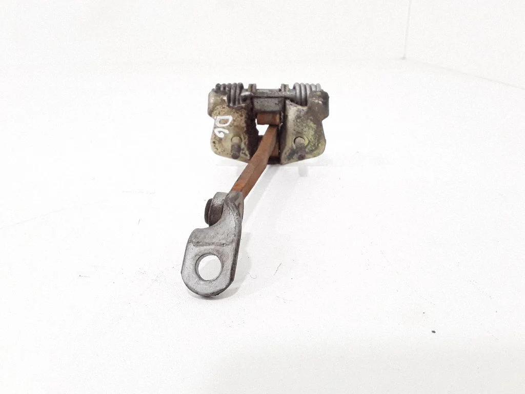 Rear door check strap stopper – rear right