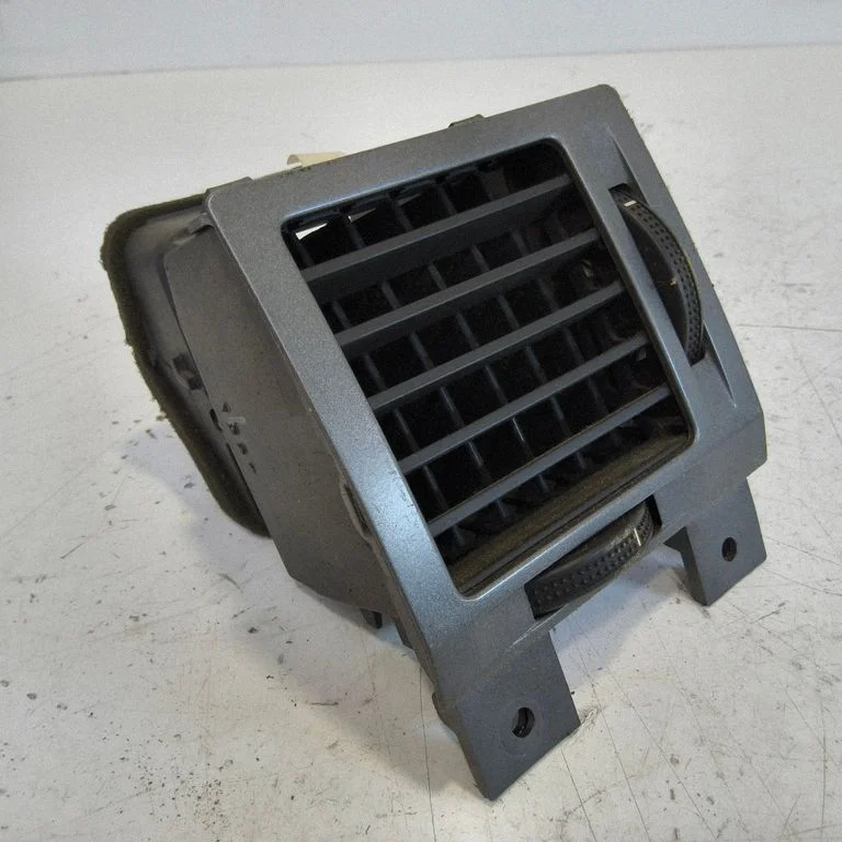 Dashboard side air vent grill/cover trim – front left