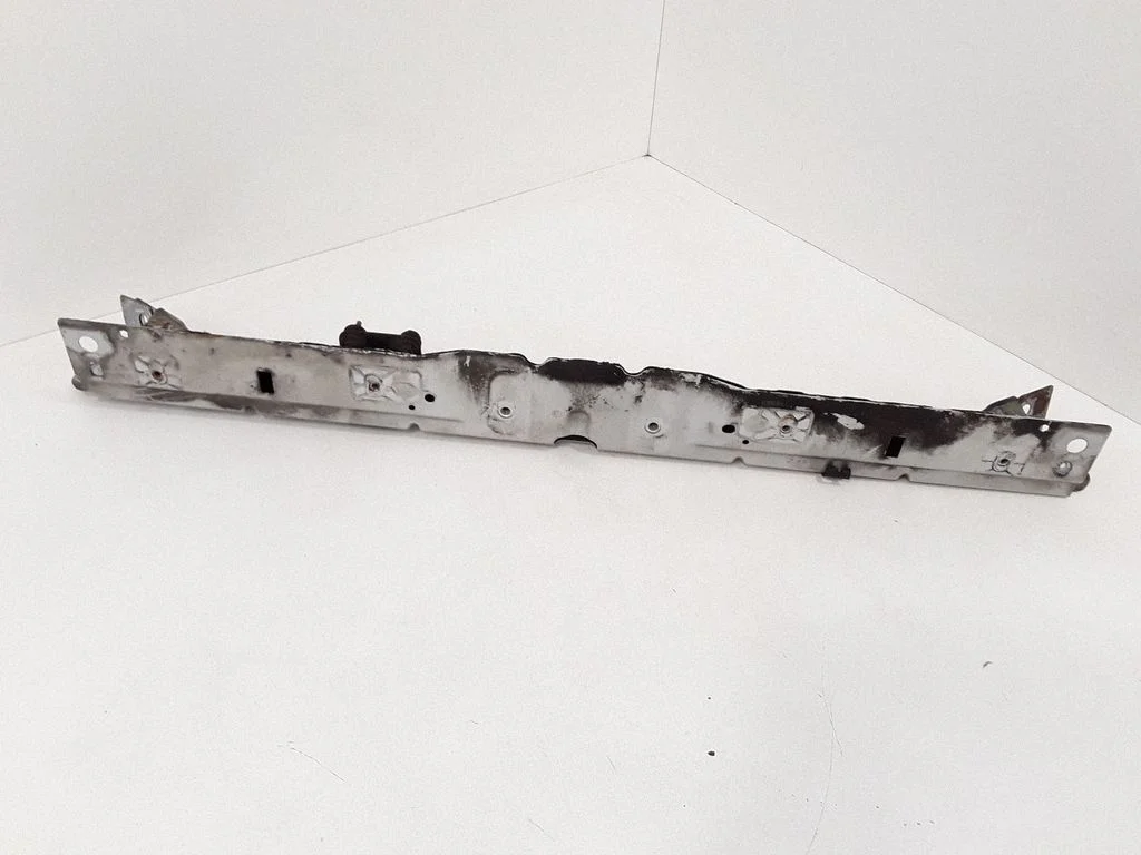 Top upper radiator support slam panel