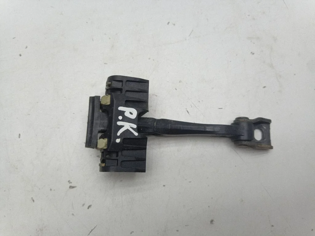 Front door check strap stopper 7070333