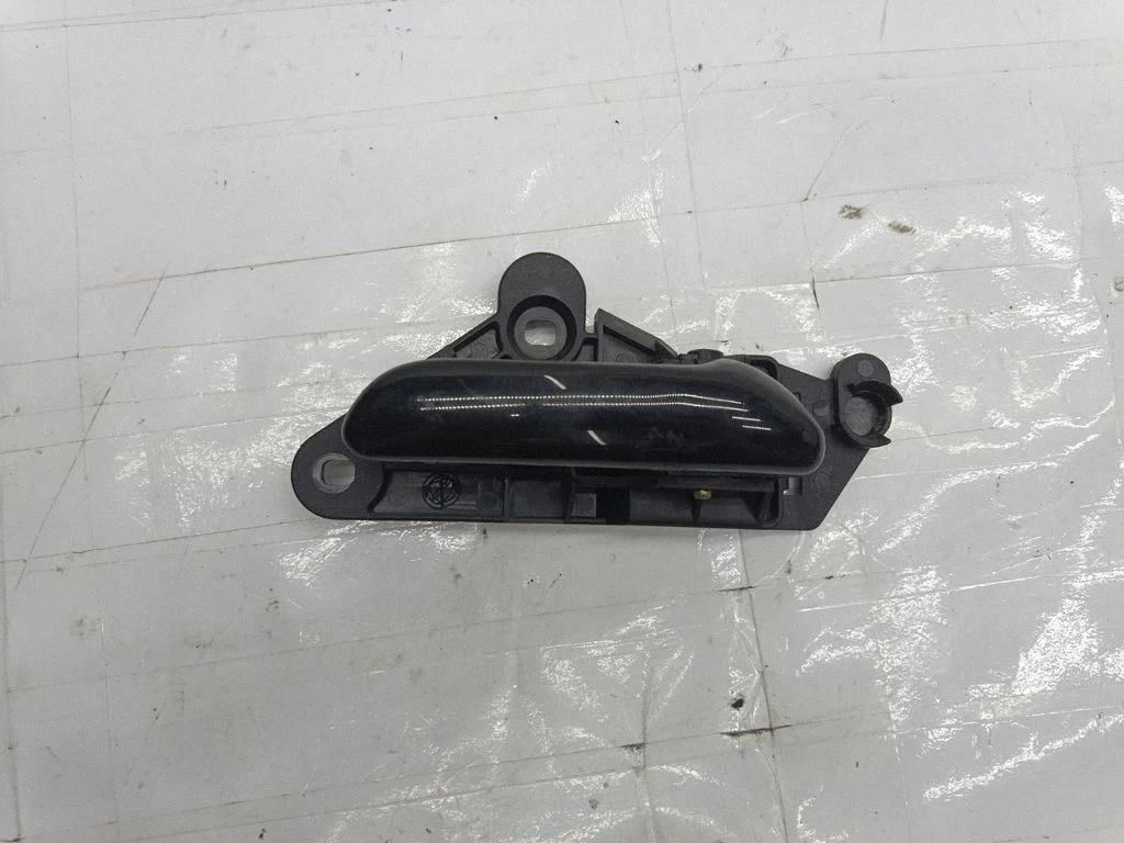 Rear door interior handle trim