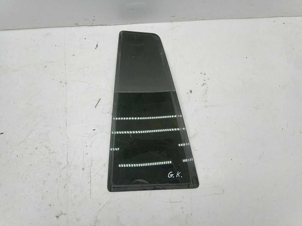 Rear vent window glass – left